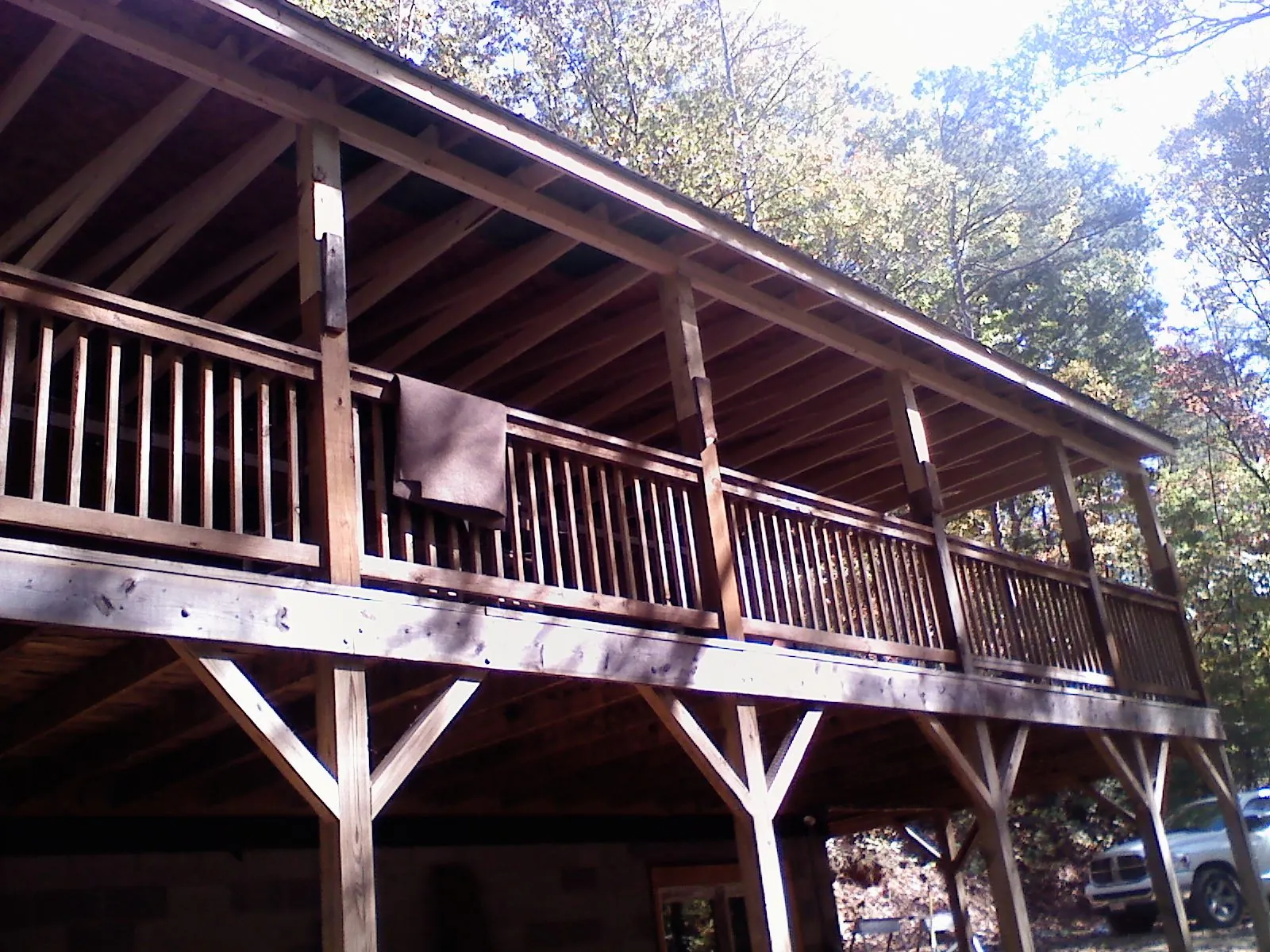 Timber framing under a new elevated porch and deck — Roof Leak Repair in Durant by Roofing Brothers